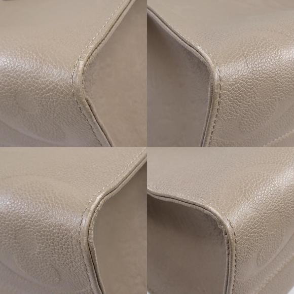 Louis Vuitton On the Go MM Tourtrail Tote Bag Empreinte/Giant Monogram - Picture 9 of 9